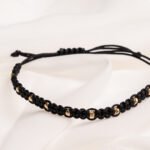 Bratara cu snur impletit si 10 bilute din aur 14k