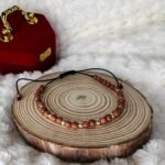 Bratara cu piatra soarelui si 9 bilute de aur 14k