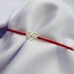 Bratara cu snur si inimioara cu labuta din aur 14k