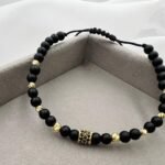 Bratara cu onix mat, charm si bilute din aur 14k