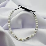 Bratara cu howlit alb si bilute din aur 14k