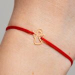 Bratara cu snur si ingeras din aur 14k