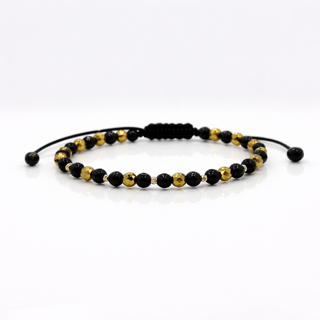 bbfeed66-2d35-49d4-90c8-c7d040752bad Bratara combinata cu hematit si onix + bilute din aur 14k - imagine 1