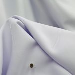 Colier fir transparent si charm cu pietricele negre din aur 14k