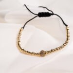 Bratara cu charm si bilute din aur 14k