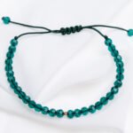 Bratara cu cristale rotunde si o biluta din aur 14k