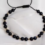 Bratara cu piatra soarelui si 10 bilute din aur 14k