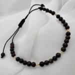 Bratara cu granat si 10 bilute din aur 14k