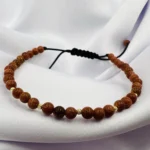 Bratara cu piatra soarelui si 5 bilute din aur