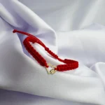 Bratara cu snur si inima cu trifoi din aur 14k