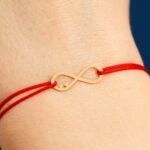 Bratara cu snur si infinit cu doua inimioare din aur 585 14k