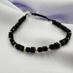 Bratara cu cristale cubice si 9 bilute disco din aur 14k