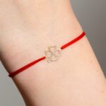 Bratara cu snur si trifoi codita din aur